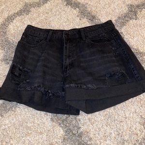 black blue jean shorts with holes